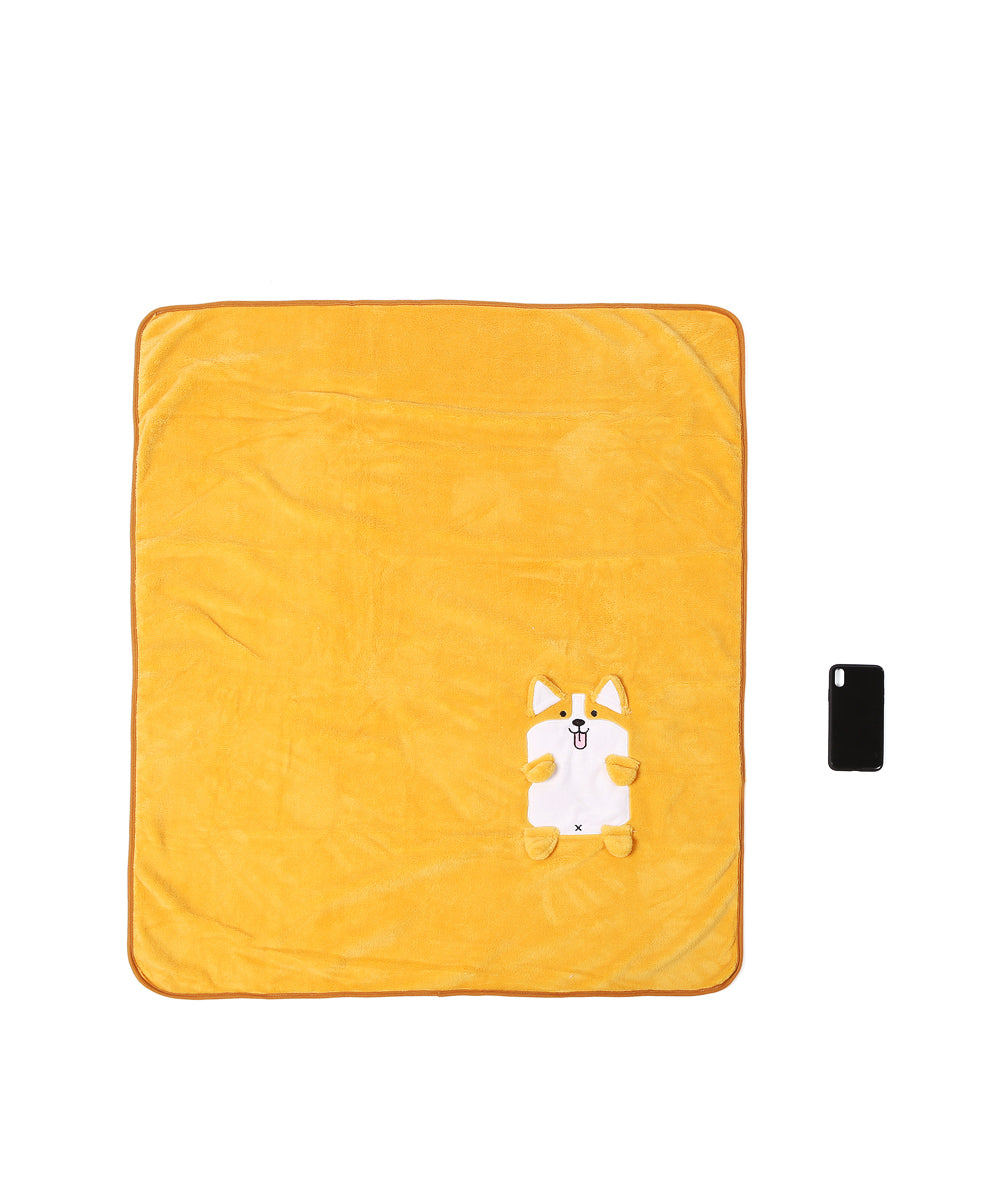Corgi Plushy Blanket unfolded next to cellphone