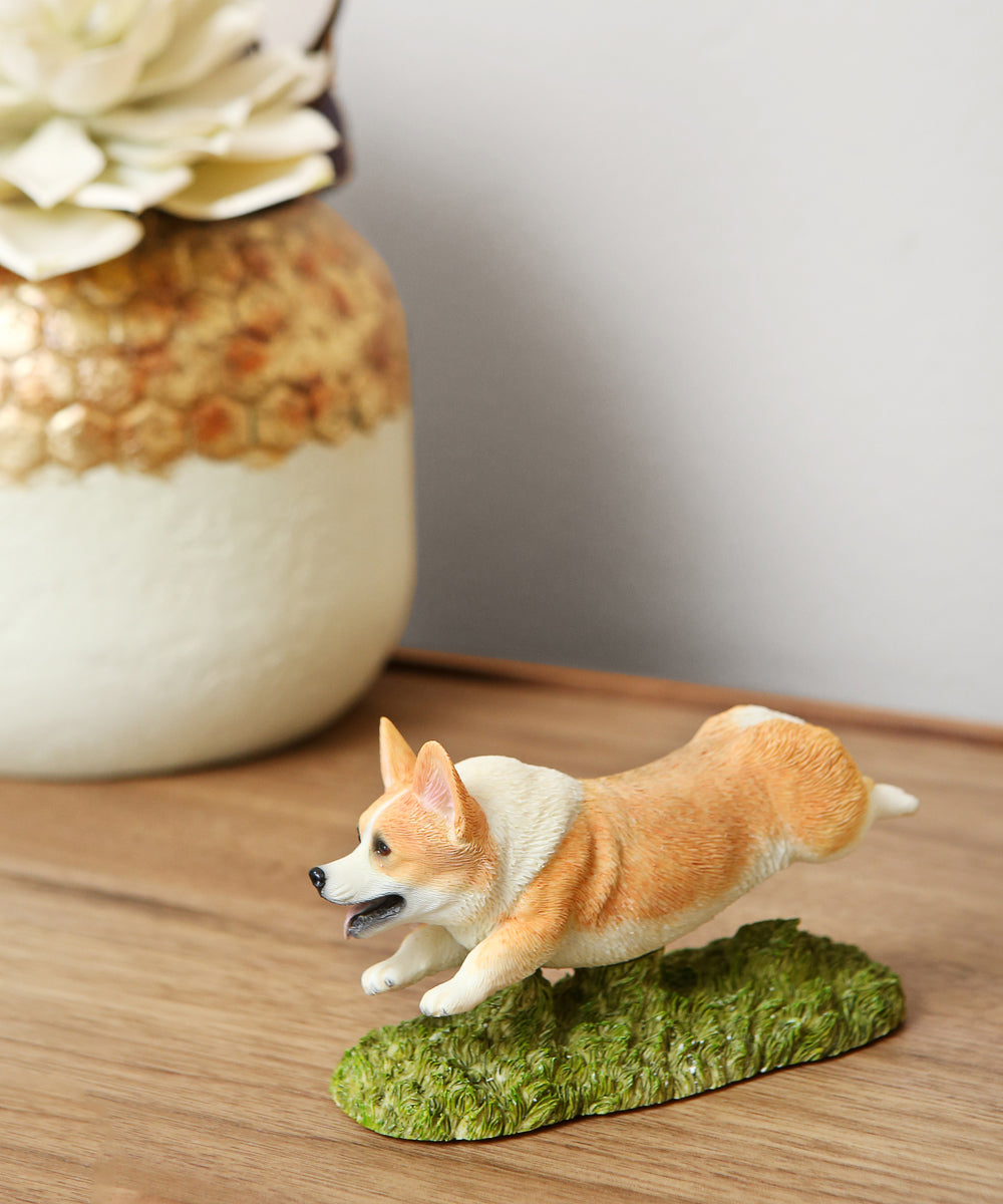 Flying Corgi Figurine on table