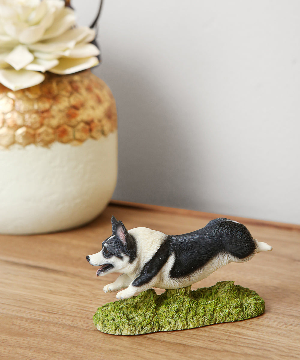 Flying Corgi Figurine on table