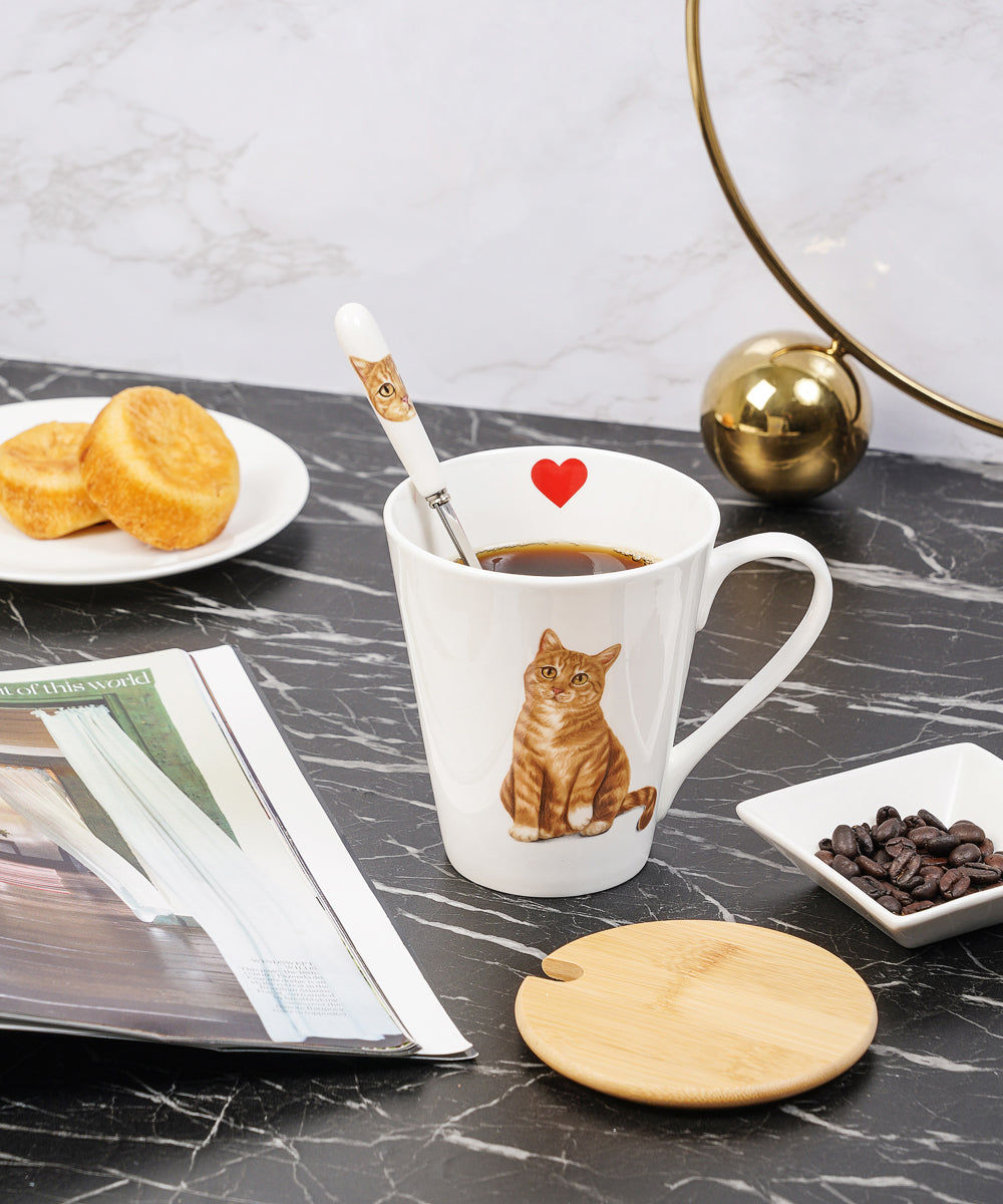 Pet Portrait Porcelain Water Cup with Lid & Spoon - Orange Tabby on table