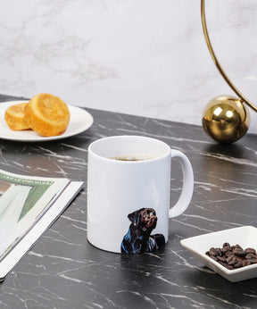 Black Labrador mug on kitchen table