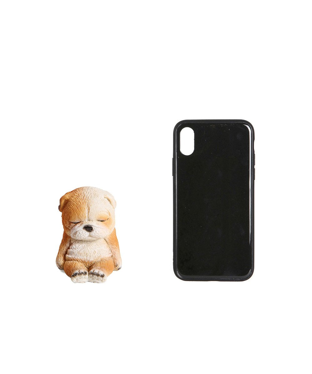 Sleeping Puppy Figurine - English Bulldog next to phone for size comparison