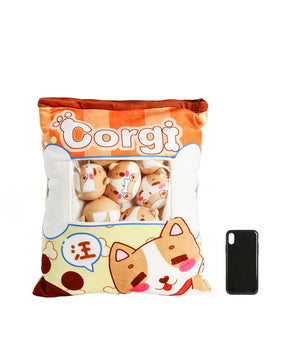 Corgi Snacks Soft Pillow next to cellphone for size comparison