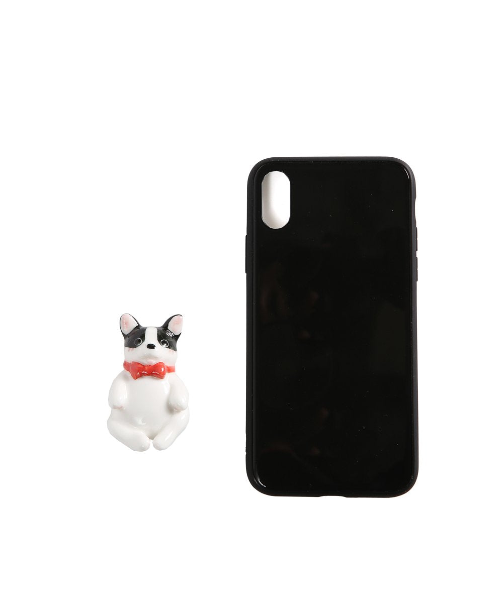 Handmade Ceramic French Bulldog Magnet next to phone for size comparison