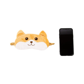 Corgi Sleeping Eye Mask with Cooling Gel Pad next to cellphone for size comparison