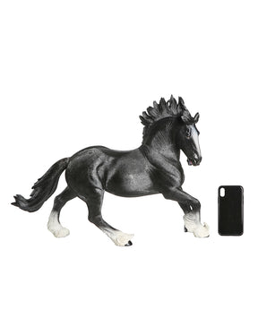 Handmade England Horse Statue next to phone for size comparison