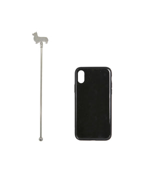 Silver Corgi Stir Stick next to cellphone for size comparison