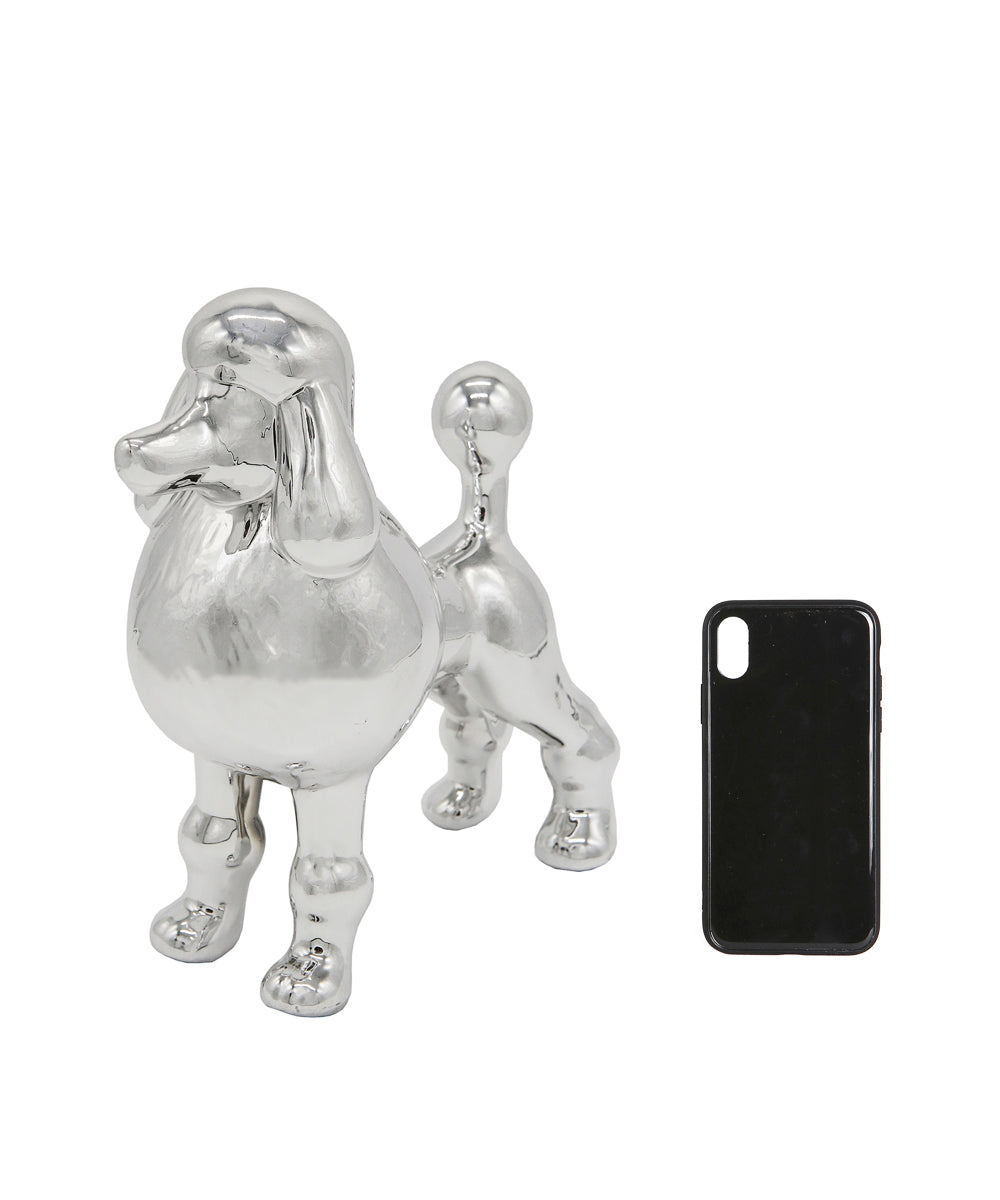 Silver Standing Poodle Ceramic Pet Statue Next To Cell Phone For Size Comparison
