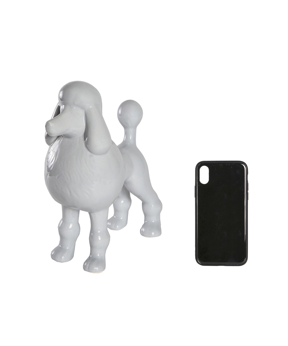Grey Standing Poodle Ceramic Pet Statue Next To Cellphone For Size Comparison