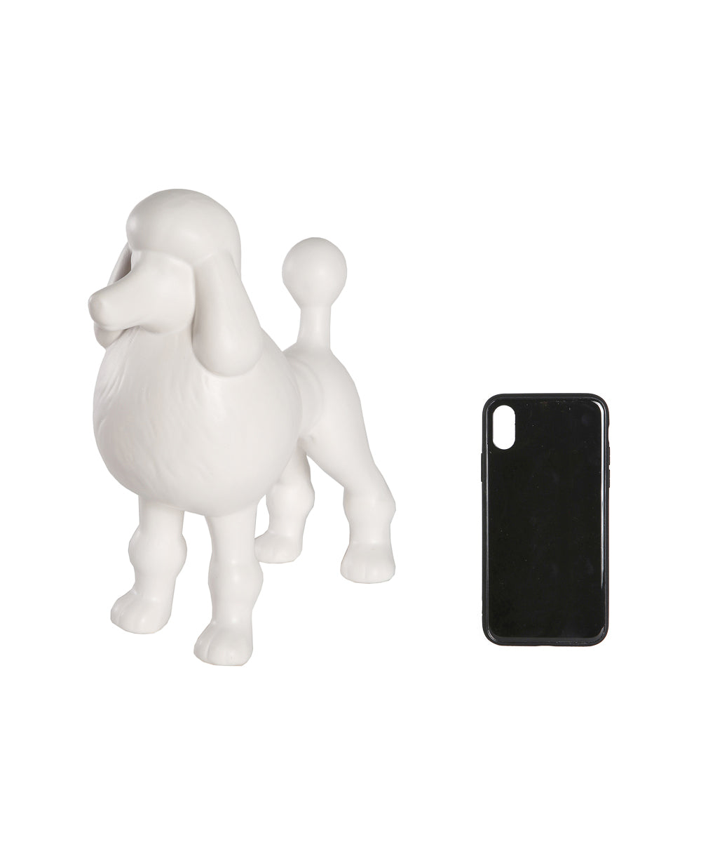 Matte White Standing Poodle Ceramic Pet Statue Next To Cell Phone For Size Comparison