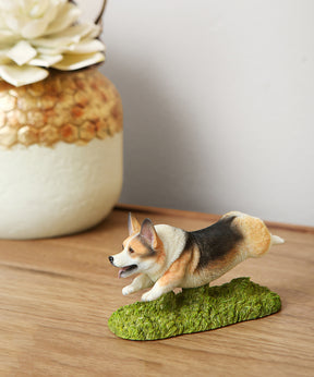 Flying Corgi Figurine On table